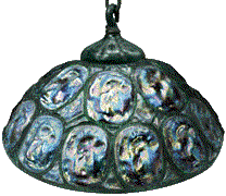 animated photo of lamp with shade changing from off (dark) to on (green)